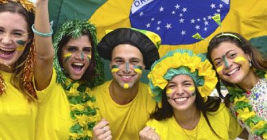 Group of happy brazilian soccer fans.