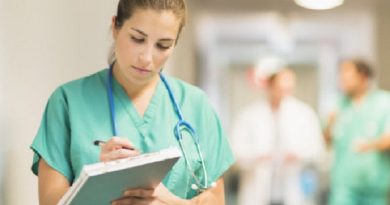 USA, New Jersey, Jersey City, Female doctor in hospital hallway