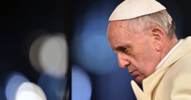 Pope Francis leads the celebration of the Way of the Cross on Good Friday on March 29, 2013 at the Colosseum in Rome. Pope Francis presided over his first Good Friday which will culminate in a torch-lit procession at Rome's Colosseum and prayers for peace in a Middle East "torn apart by injustice and conflicts".     AFP PHOTO / GABRIEL BOUYS