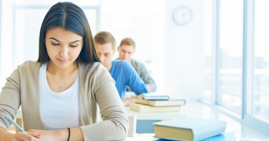 Portrait of pensive student carrying out test at lesson