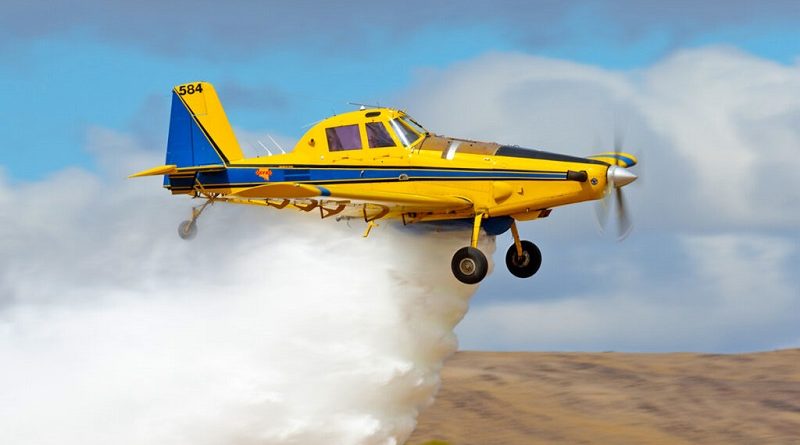 Rowland Flat, Australia - April 14, 2013: Air Tractor 802 agricultural and fire bombing aircraft VH-ODH dropping a load of water.