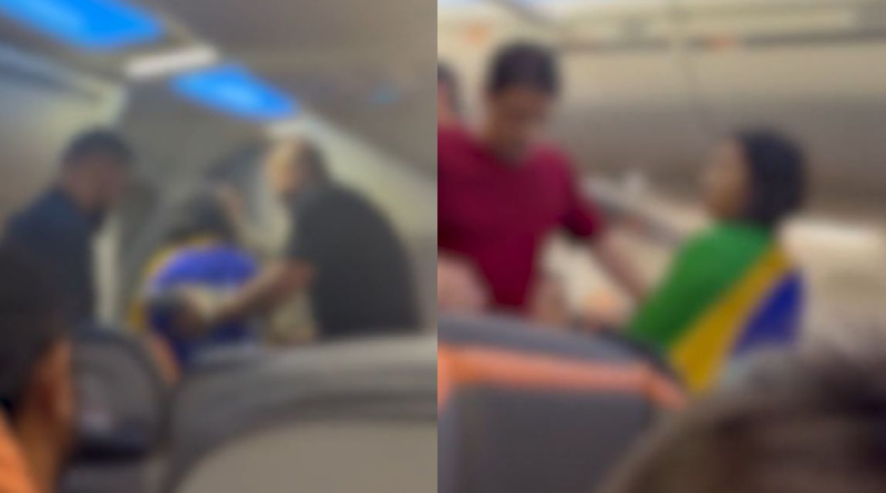 mulher espulsa de aviao